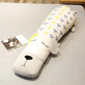 Doudou peluche chien blanc dormeur et bienveillant