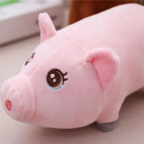 Petit doudou cochon rose aux grands yeux
