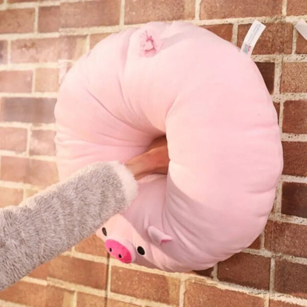 Peluche cochon rose avec un gros groin