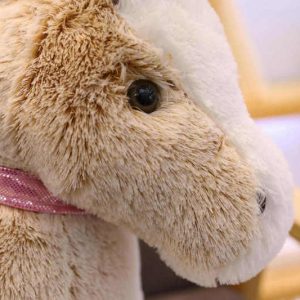 Cheval en peluche de grande taille à dorloter