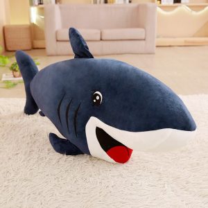 Jouet requin bleu sympa et aux yeux brillants