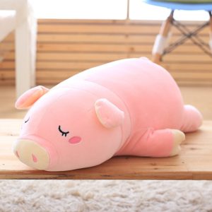 Peluche géante bébé cochon endormie et moelleuse