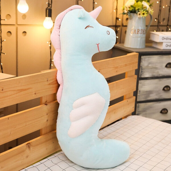Doudou géant licorne au visage sympathique
