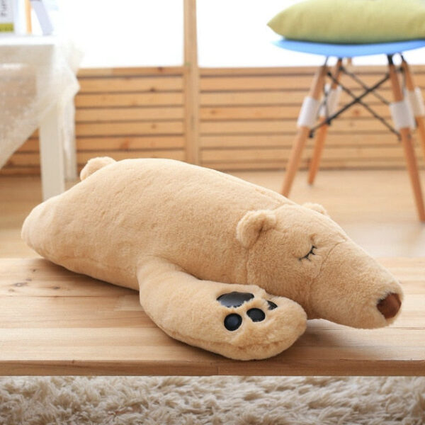 Nounours brun endormi friand de câlins
