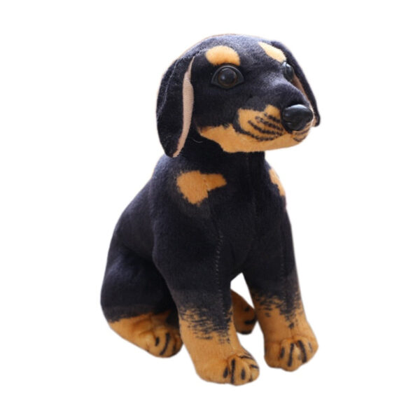 Petit bébé rottweiler en peluche donneur de joie