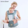 Porte-bébé insulaire avec assise sur la hanche